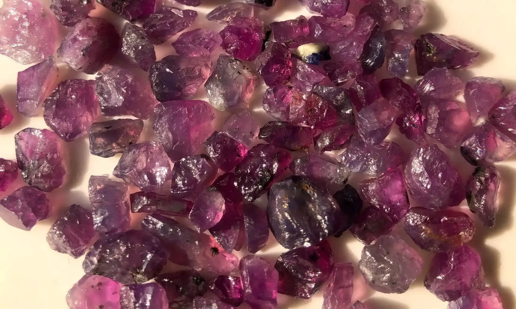 100 carats Facet Rough Parcel of Purplish Raw Sapphires